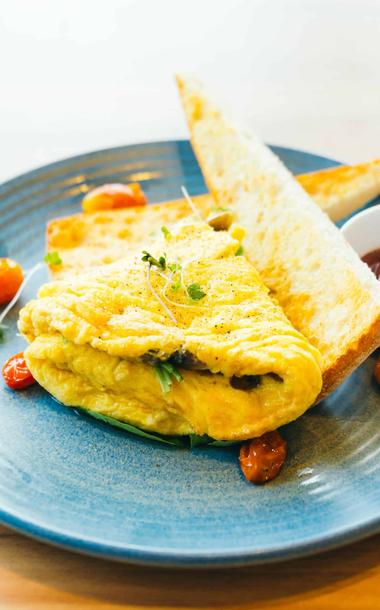 5 Healthy Cuban Breakfast Ideas to Start Your Day Spanich omelet with bread and tomato sauce for breakfast